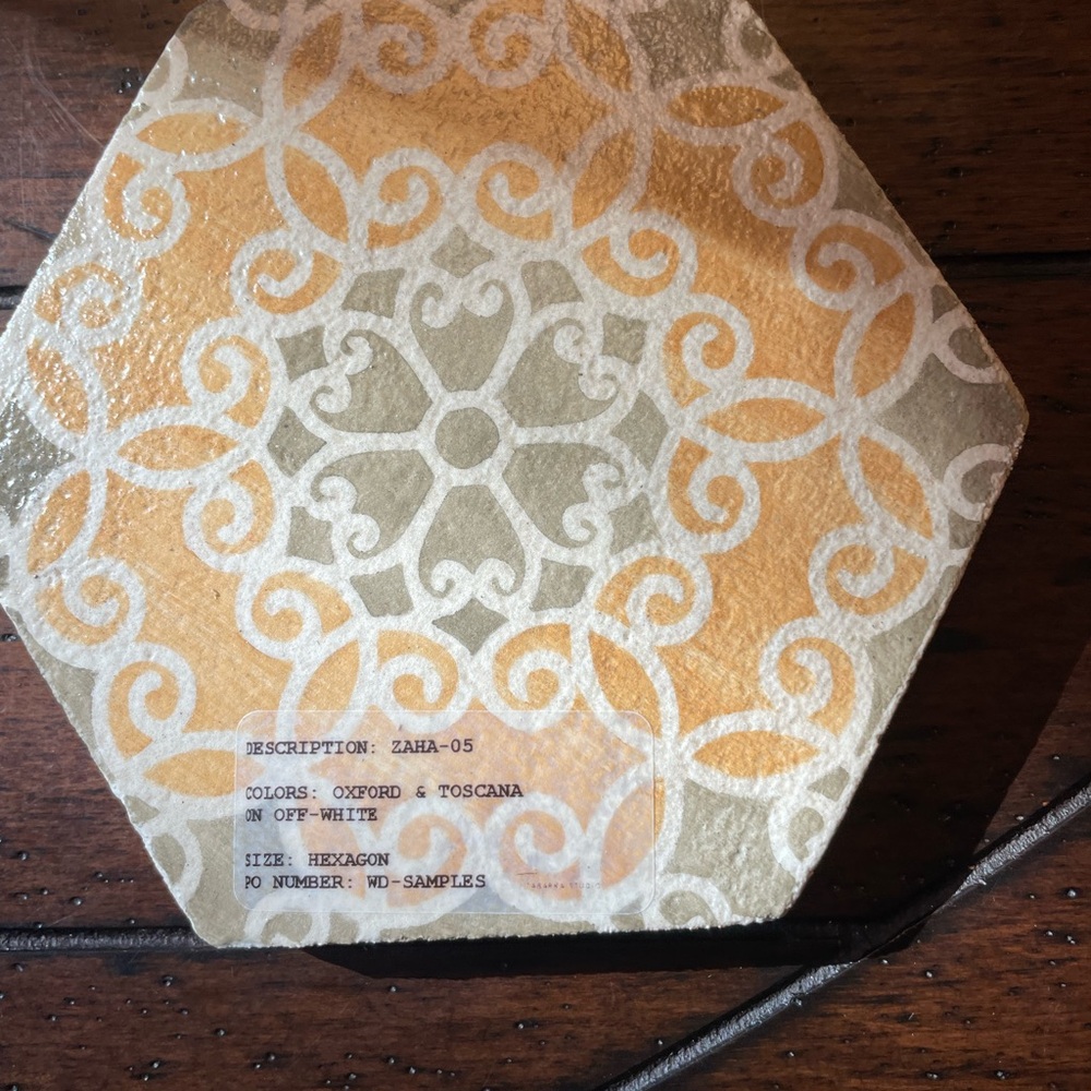 Tabarka Hexagon Patterned Tile in Off-White, gray and orange.  Sample